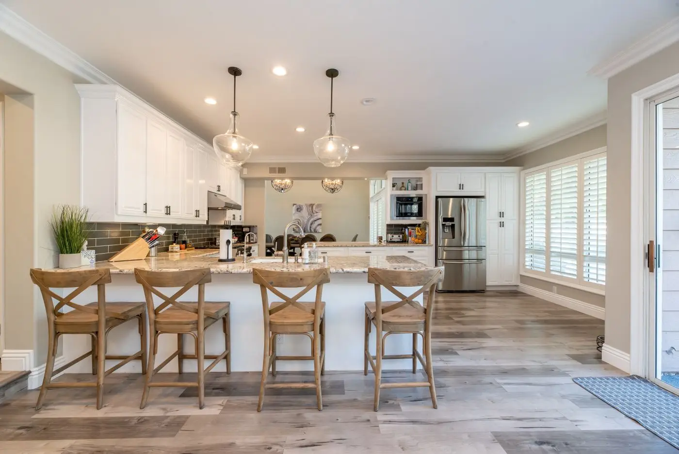A bright residential kitchen with cabinets and counters. San Jose.