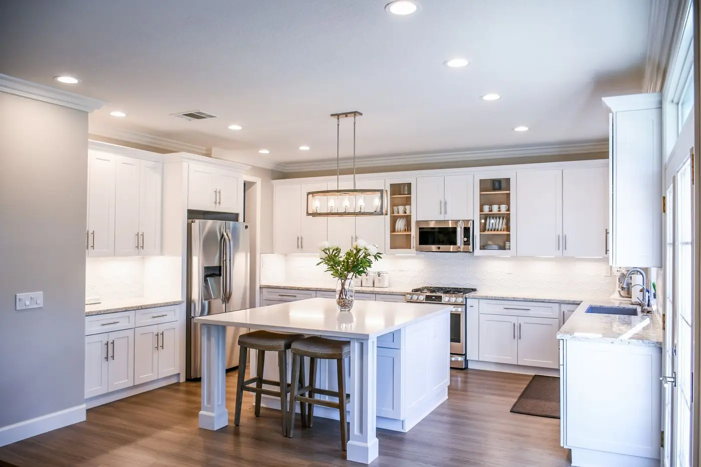 A bright residential kitchen with cabinets and counters. San Jose.