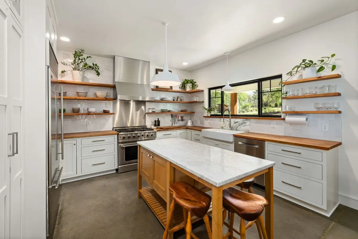 A bright residential kitchen with cabinets and counters. San Jose.