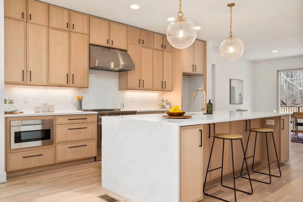 A bright residential kitchen with cabinets and counters. San Jose.