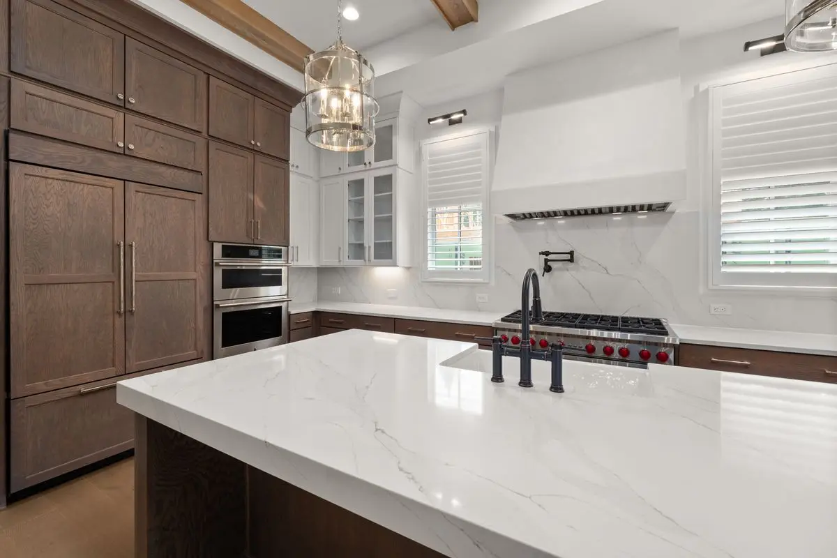 A bright residential kitchen with cabinets and counters. San Jose.