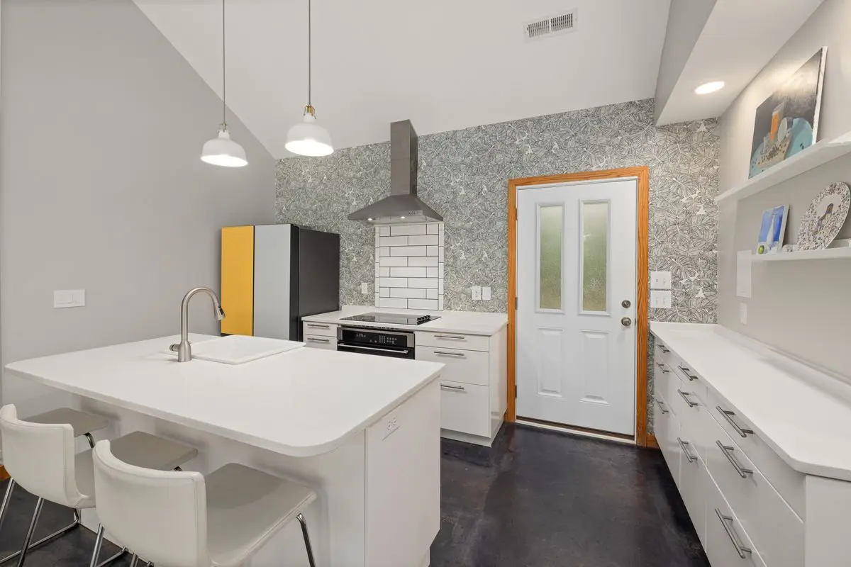 A bright residential kitchen with cabinets and counters. San Jose.